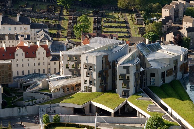 An aerial photo of the Scottish Parliament building, including Queensberry House, the office of the Presiding Officer
